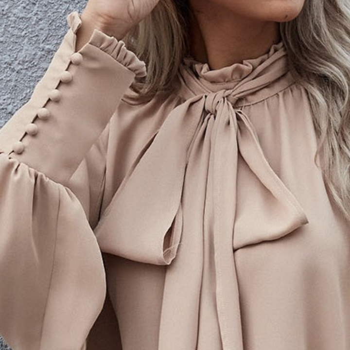 Laura - Elegancka bluzka damska o ponadczasowym wyglądzie