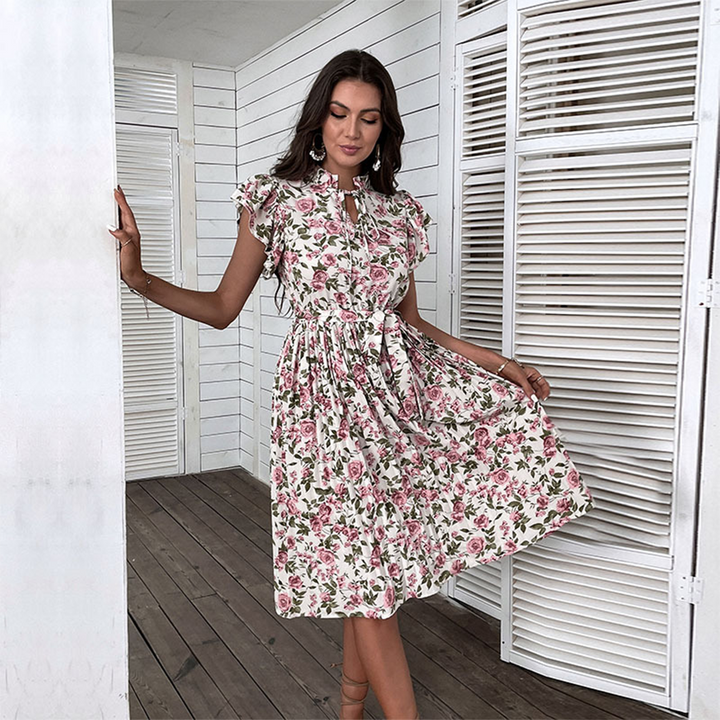 CAPUCINE - Elegancka sukienka w kwiaty zapewniająca wyrafinowany wygląd